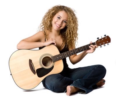 Woman smiling with acoustic guitar