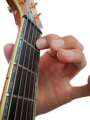 View of the C note on the guitar from the player's perspective