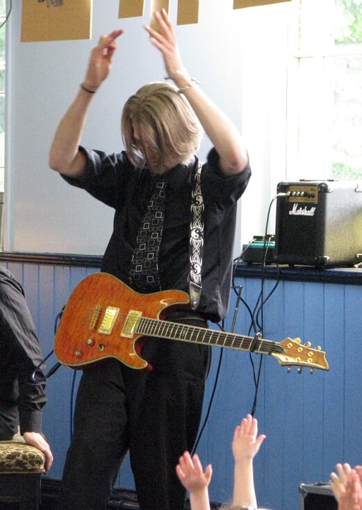 Mike playing in a school concert