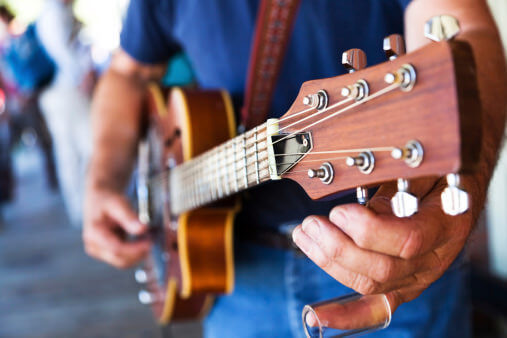 Close up of guitar fretboard